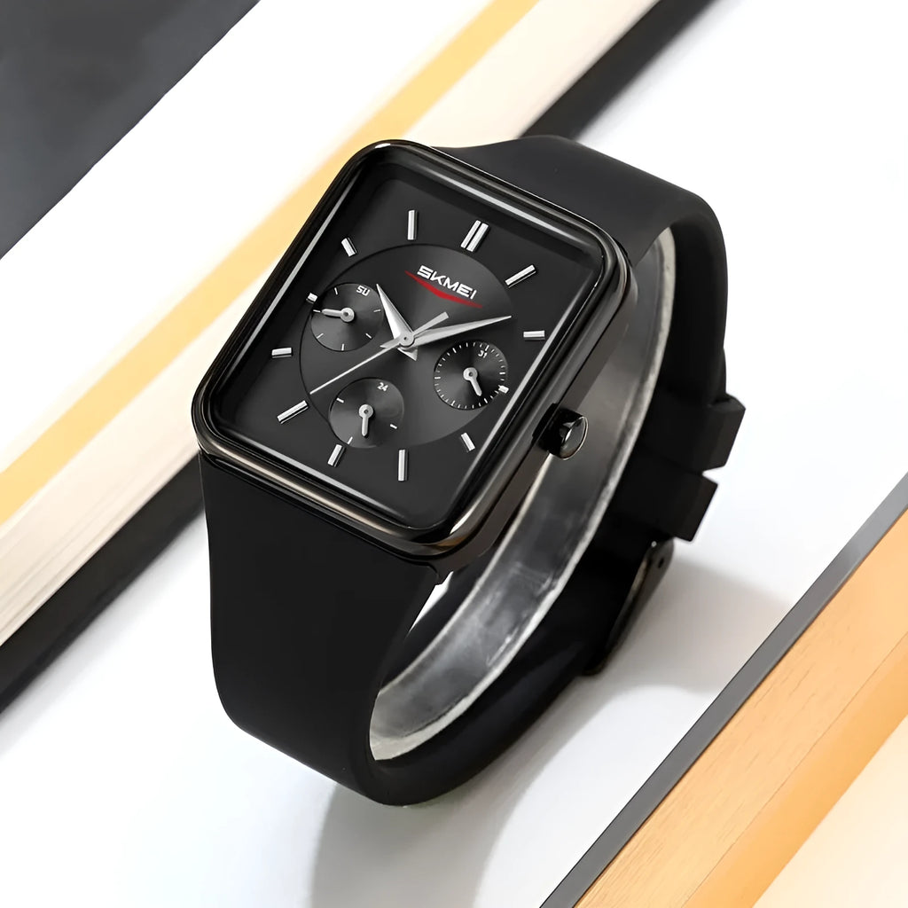 Square analogue silicone watch for women in white rose gold colour on a wrist, showing slim profile.