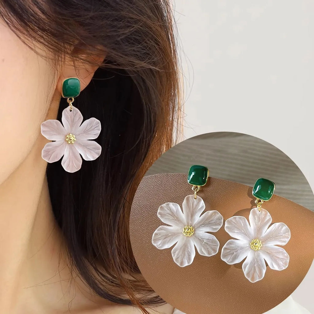 Dark green floral drop earrings with sterling silver finish and needle flowers design