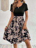 Women's casual print lace-up dress with A-line skirt and shoulder strap detail in khaki colour