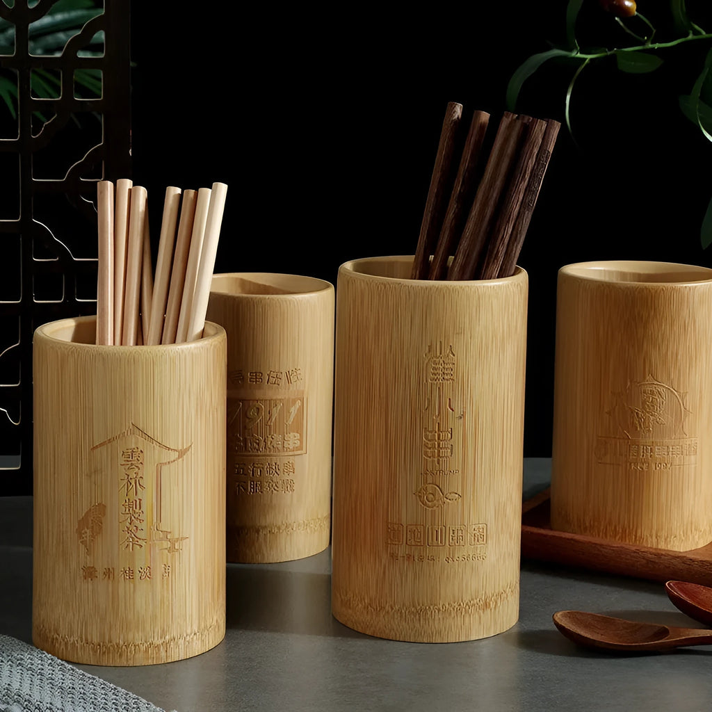 Natural bamboo cylindrical chopstick holder tube for utensil storage.