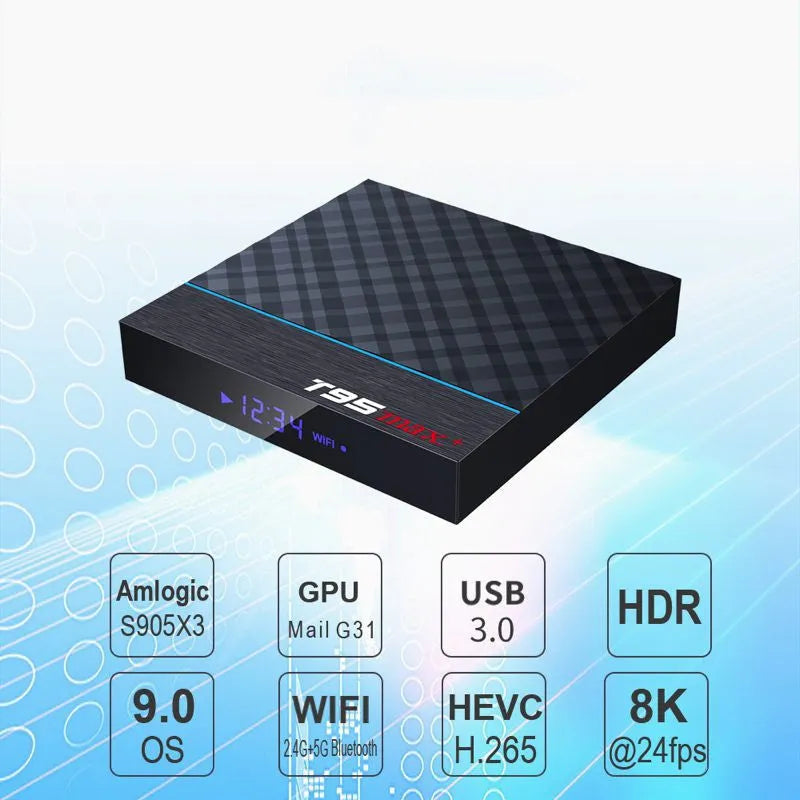Black T95 Max Plus Android TV box with remote control on a table.