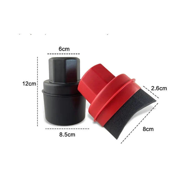 Black and red tyre polishing sponge brushes with protective lids on a white background