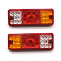 Black semi-closed taillight for electric tricycle, 200mm wide by 70mm high.
