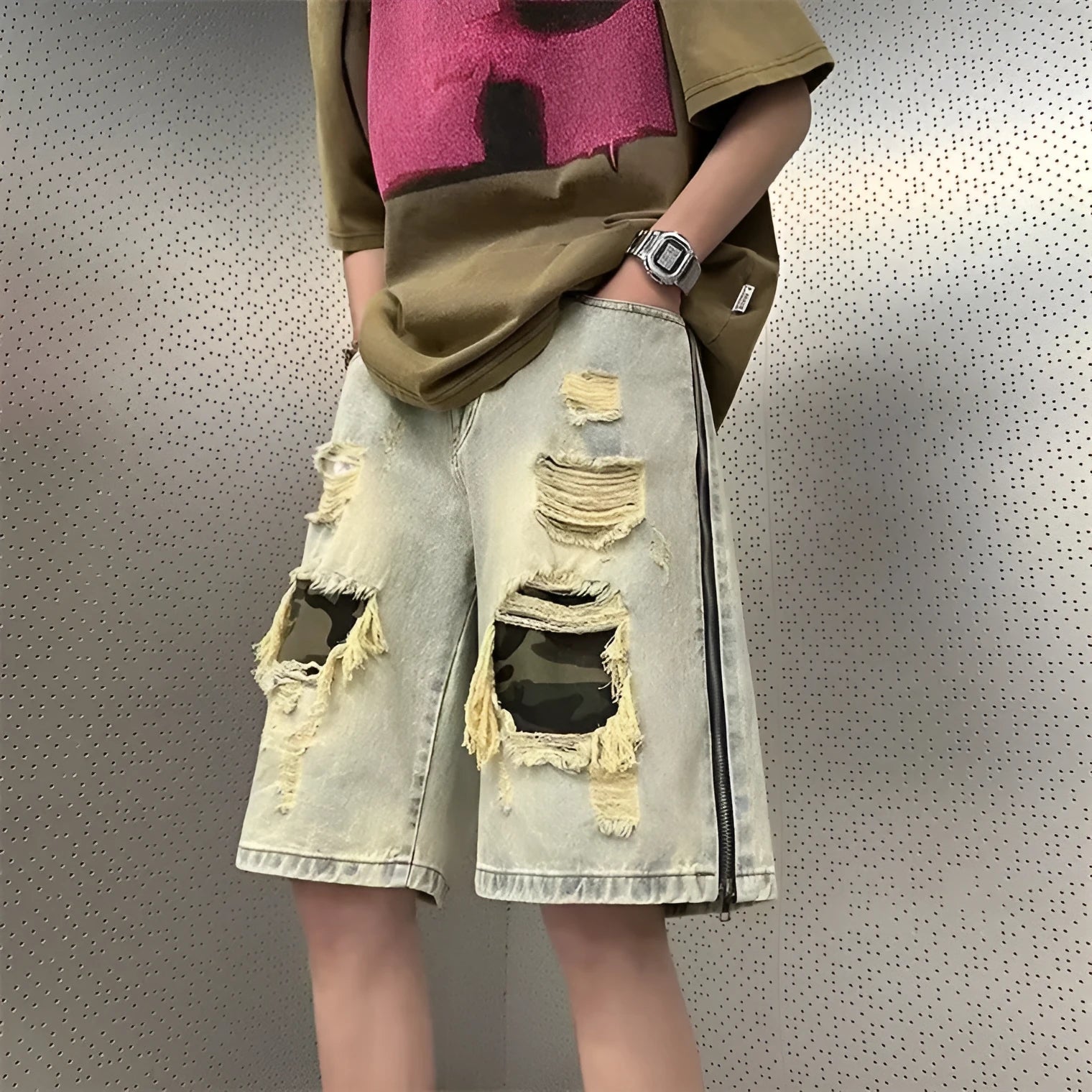 Men's yellow mud camouflage cotton denim cargo shorts with ripped details and straight leg.
