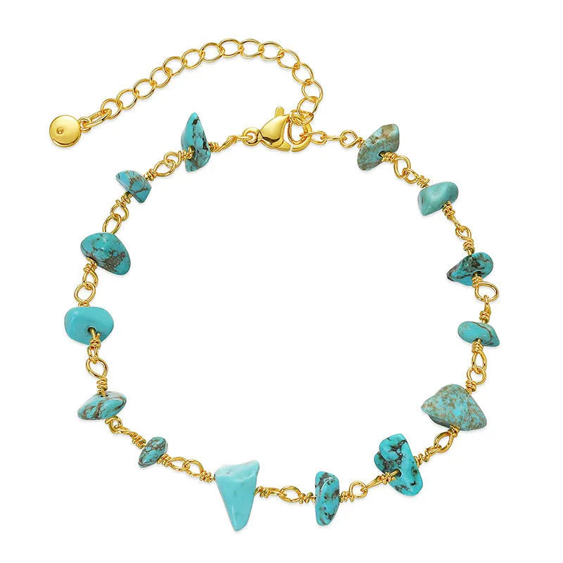 Women's geometric turquoise bracelet with irregular natural gravel stones and crystal accents on gold-plated copper