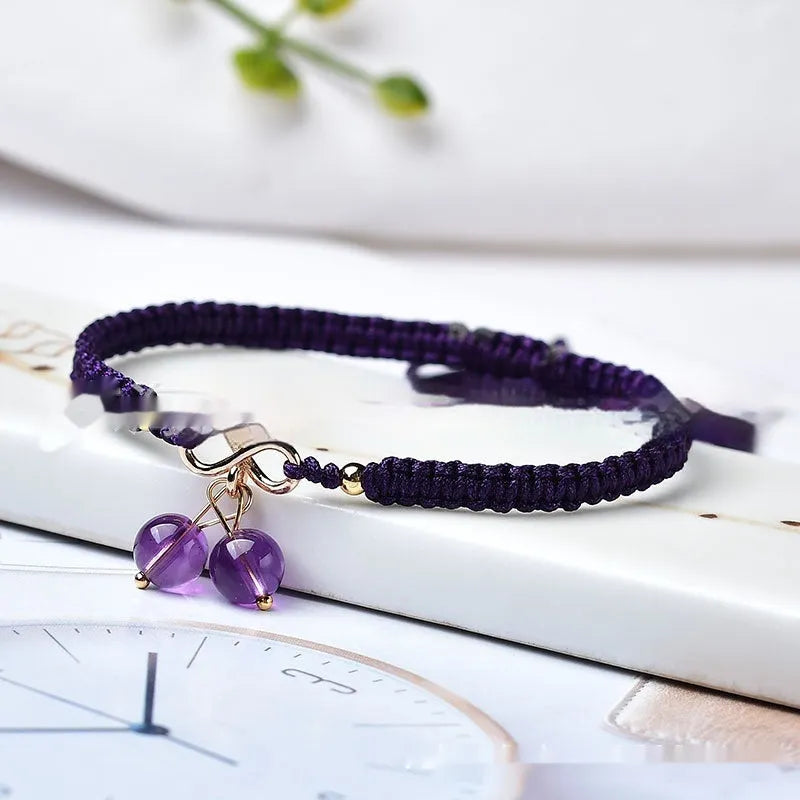 Natural strawberry quartz cherry bracelet for women on adjustable elastic cord, showing fruit-shaped crystal design.