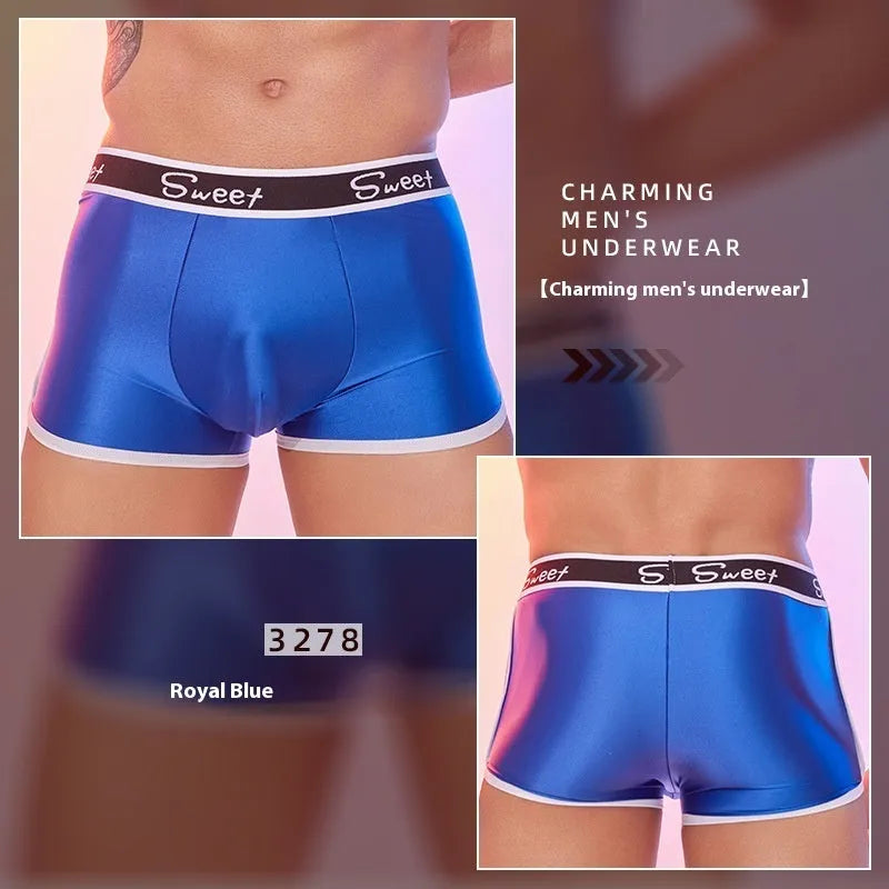 Men's shiny silky nylon boxer shorts in black, white, and sapphire blue colours.
