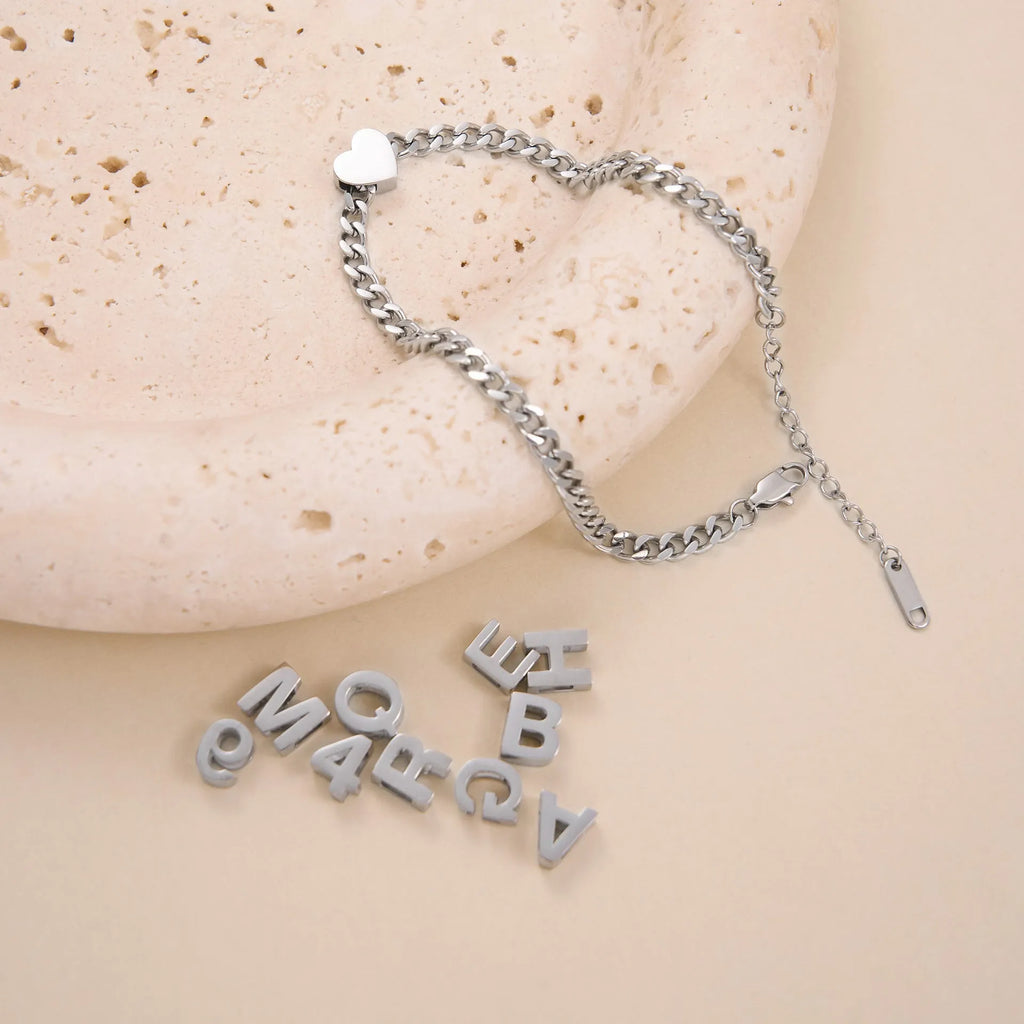 Gold electroplated titanium steel necklace with letter A charm on 40cm chain