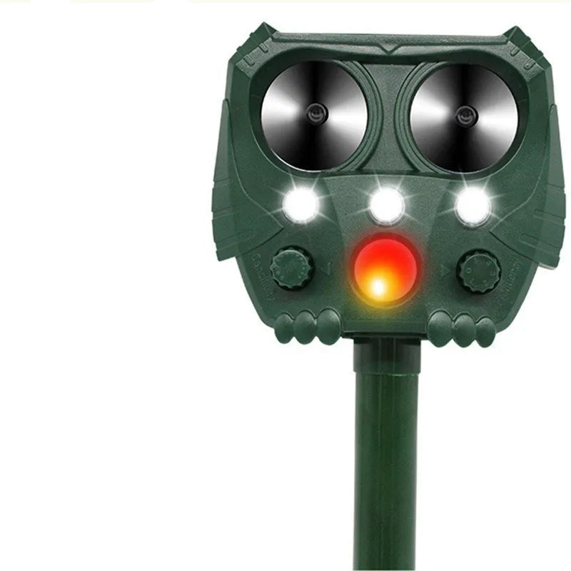 Green solar ultrasonic animal repeller with LED strobe lights for outdoor pest control