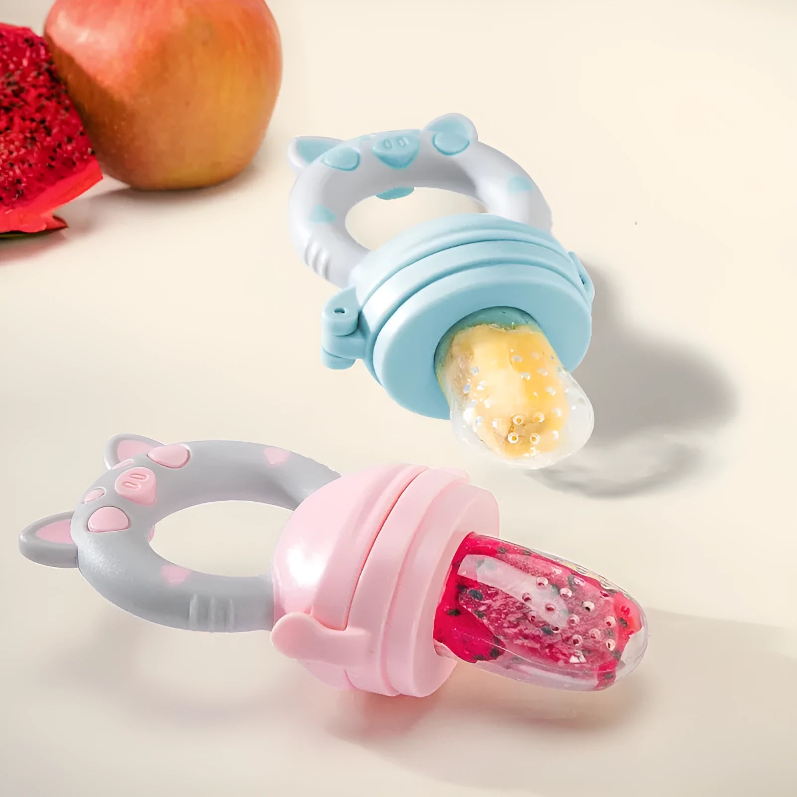 Blue, green, and pink BPA-free silicone baby teethers showing one and three mouthpiece style options.