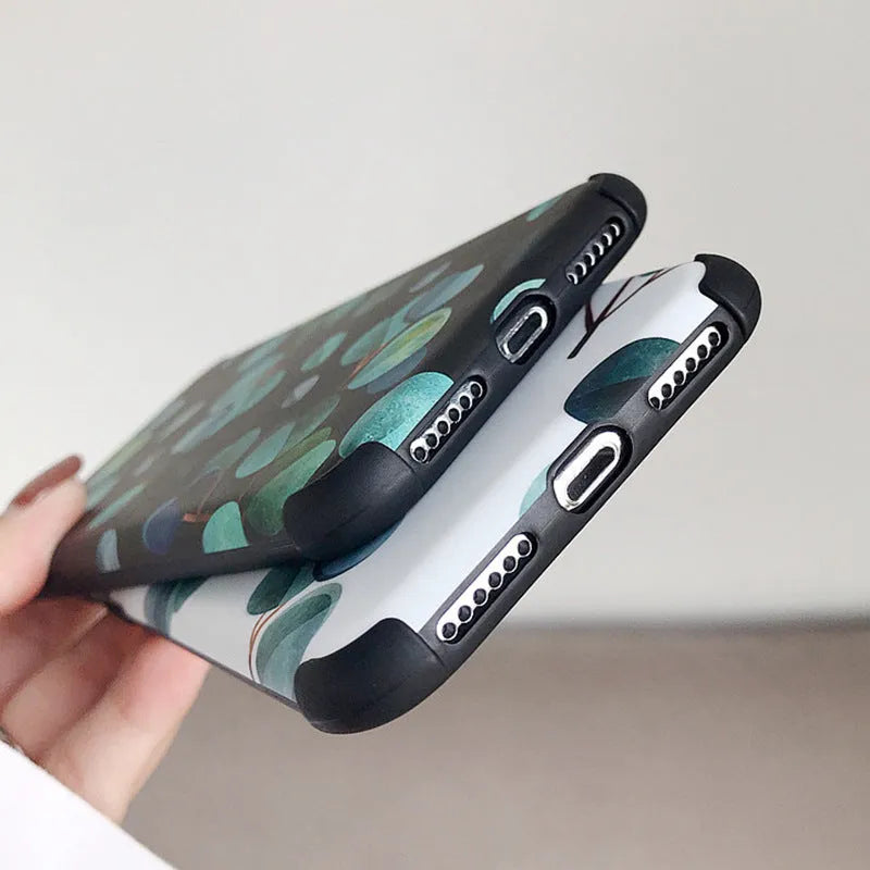 Black silicone leaf pattern phone case shown fitted on an iPhone.