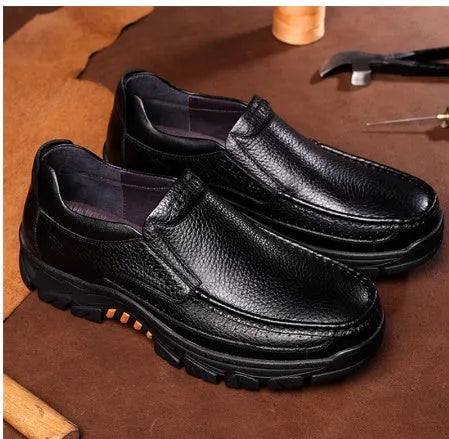 Men's black leather slip-on business casual shoes with a rubber sole
