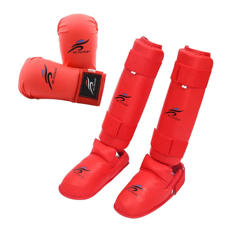 Red and blue karate protective gear set with helmet, boxing gloves, and leg guards for martial arts training