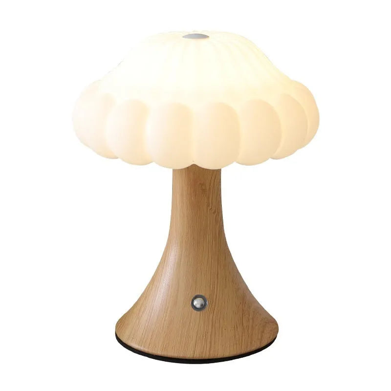 Mushroom-shaped USB rechargeable touch lamp in wood grain finish on table