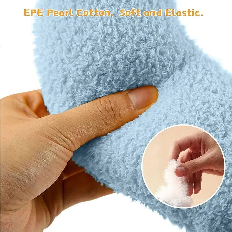 Small U-shaped plush pet pillow in blue for cats and small dogs, showing quilted faux fur texture.