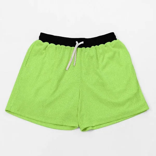 Men's solid colour mesh quick-drying shorts in black, shown laid flat.