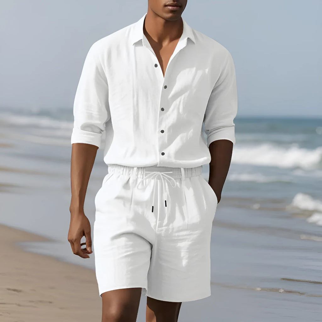 Men's linen long sleeve shirt and shorts beach suit set on a hanger, shown in a light blue colour.