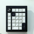 Wireless mechanical numeric keyboard with three connection modes in black and white colour options