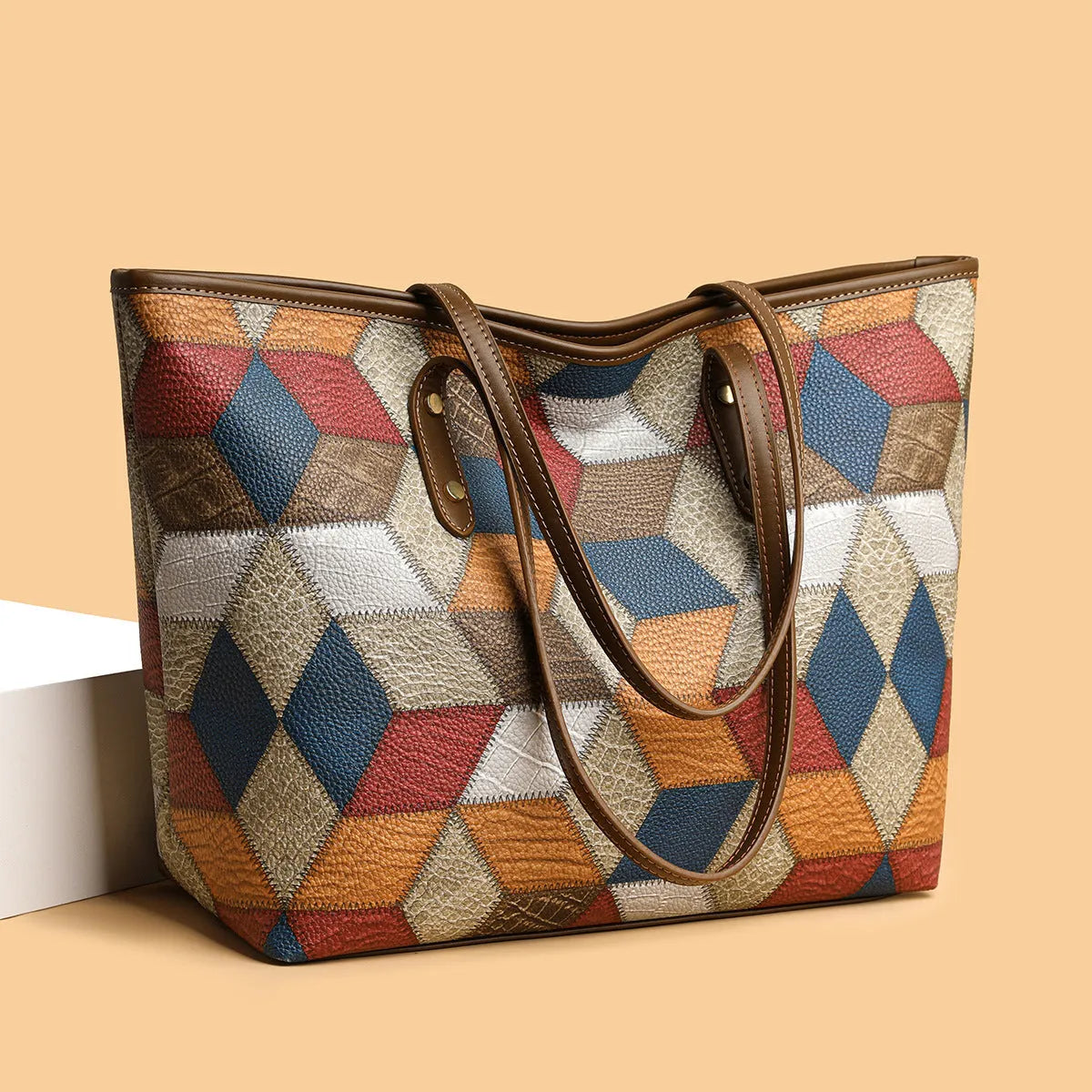Women's PVC shoulder handbag in blue brown colour with sandwich pocket design for business commuting