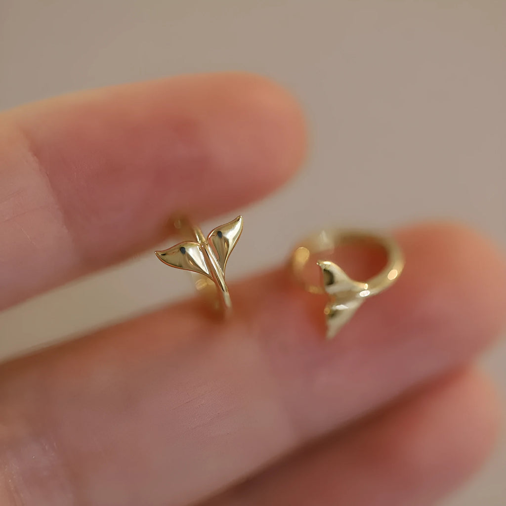 Women's sterling silver fishtail earrings in gold colour with smooth band design