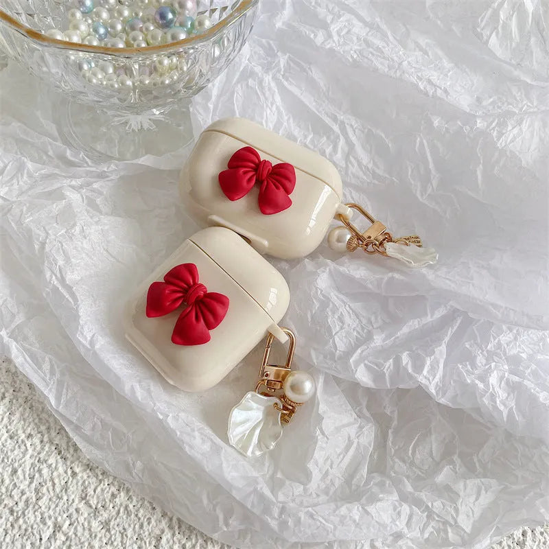Beige red bow shell wireless earphone case for AirPods models with TPU clamshell design
