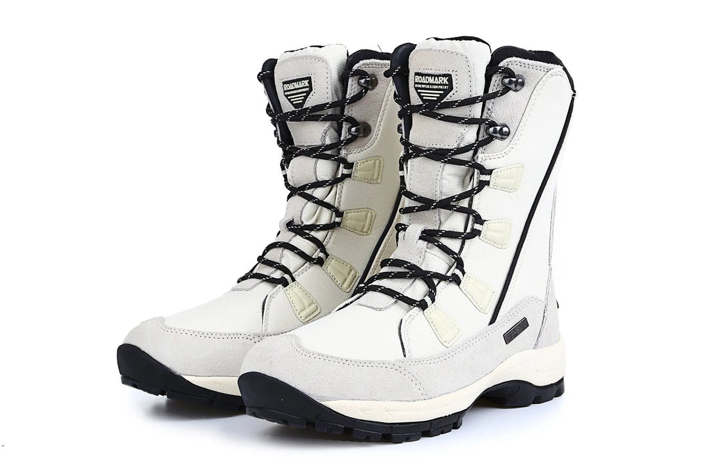 Black women's mid-calf leather snow boots with a round toe and thick rubber sole on a white background.