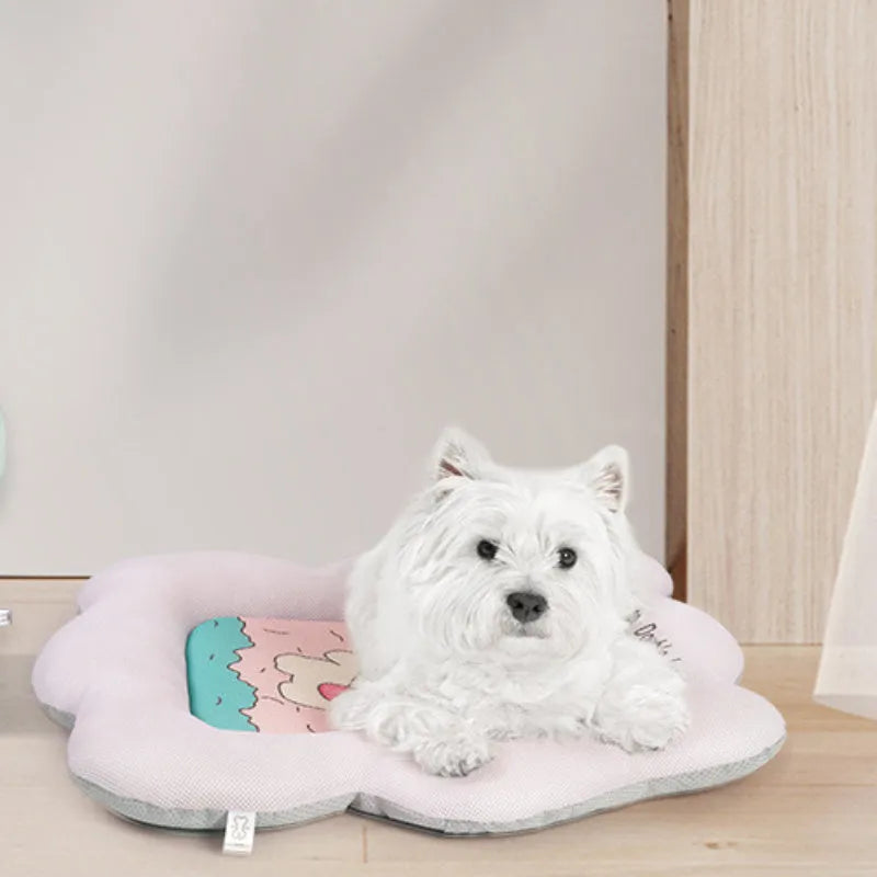 Ice silk pet cooling mat in green or pink colours showing four size options for dogs and cats