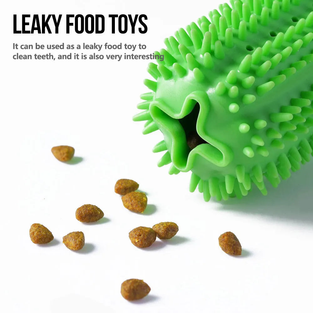 Green TPR dog chew toy with small and large molar rods and suction cup base