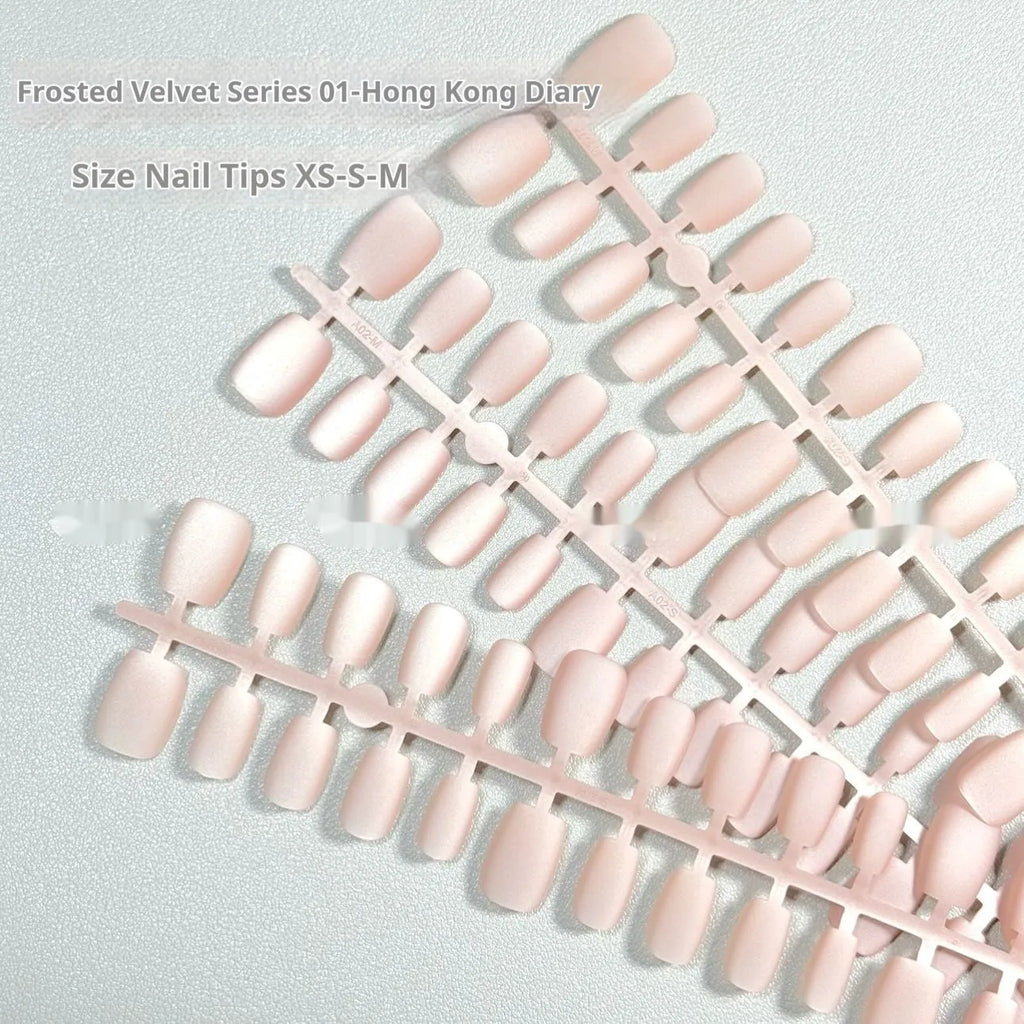 Frosted velvet Cat's Eye Aurora effect artificial nail set in short ladder sizes on a display card.