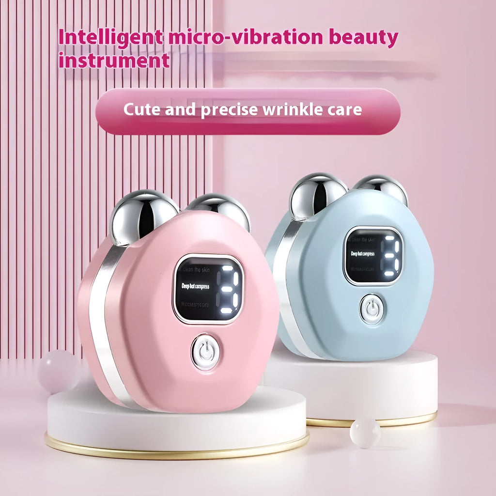 Portable white hot compress micro current facial massage instrument with dual rollers on a pink background.
