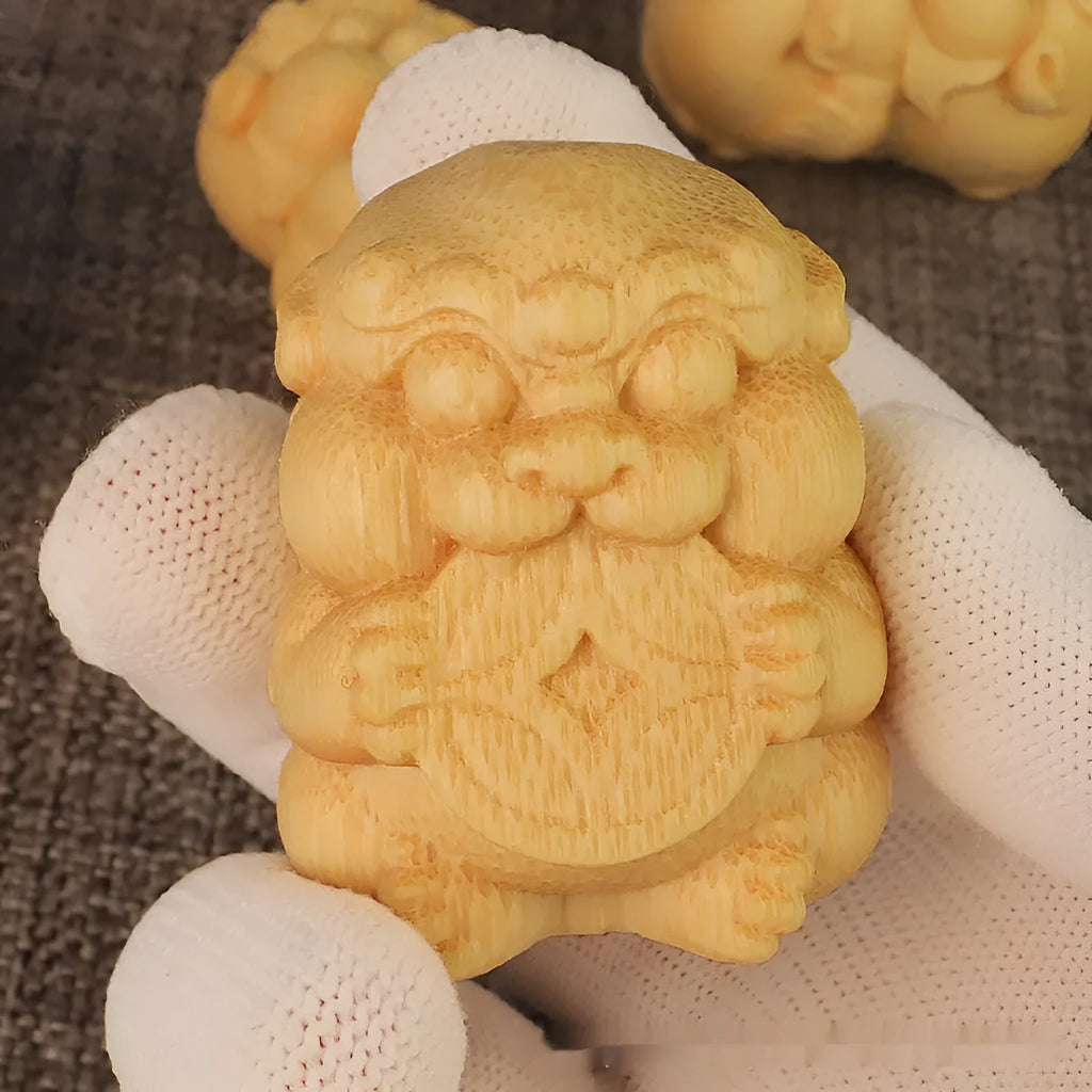 Solid bamboo carving ornament with Take Money motif, 4.5cm tall.