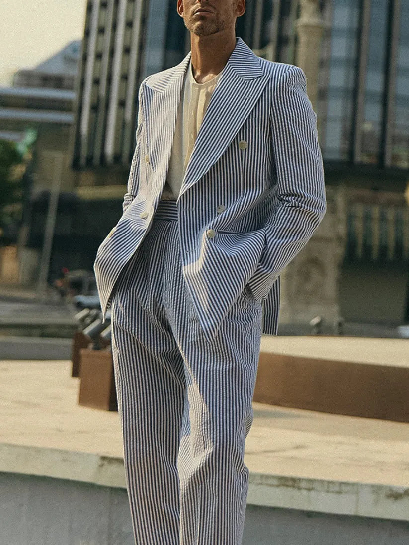 Blue and white striped polyester suit set with blazer and trousers