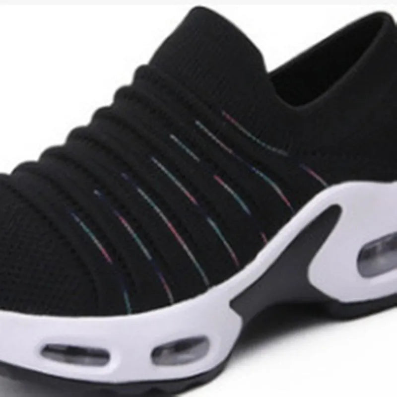 Women's stretch knitted sock shoes in light grey with fly-knit mesh upper and low heel