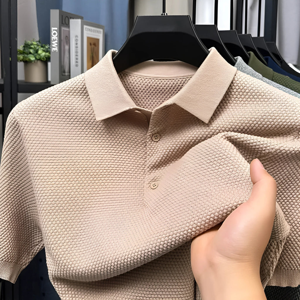 Loose fitting short sleeve cotton pullover sweater in a solid colour on a hanger