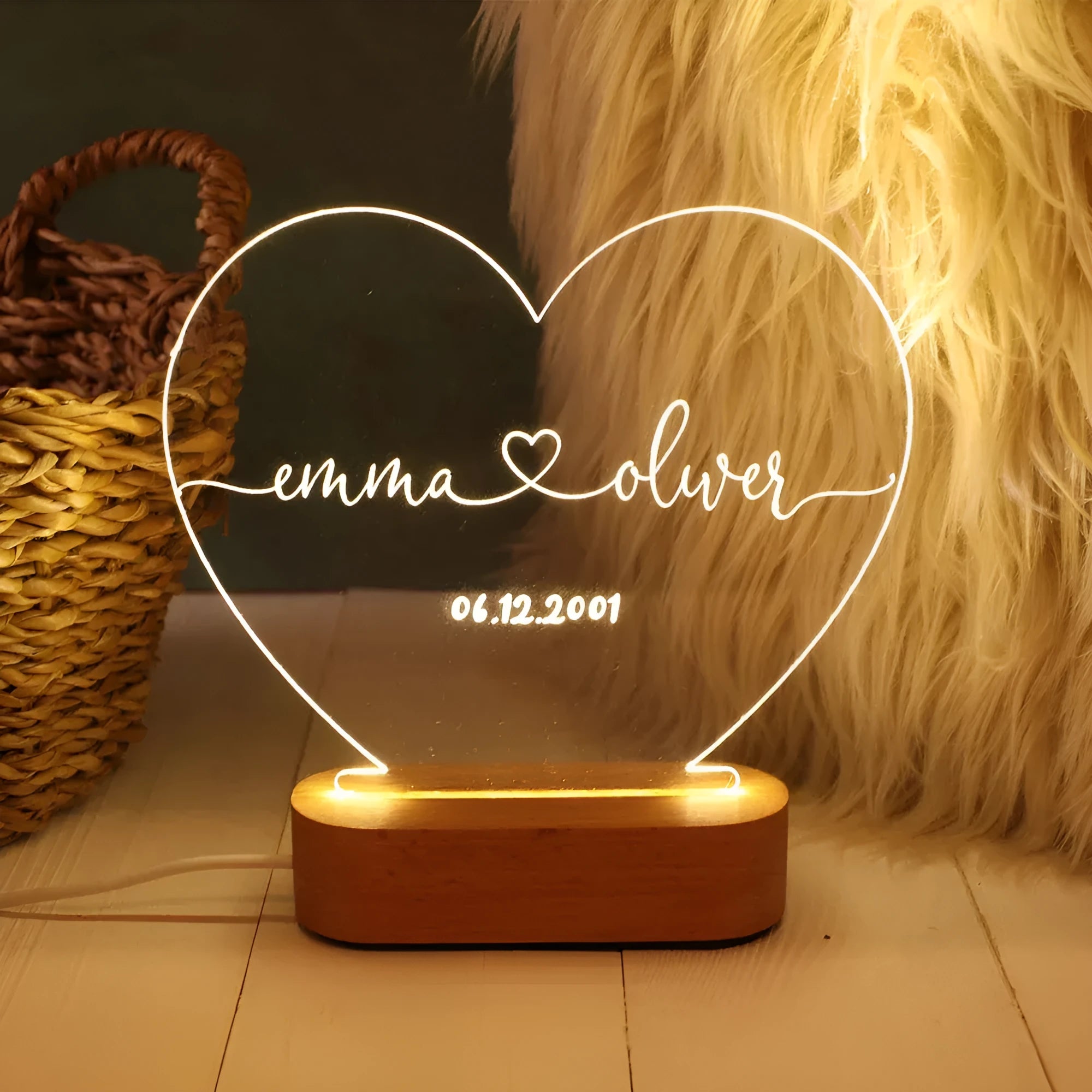 Custom acrylic night light with illuminated personalised names and dates for bedroom