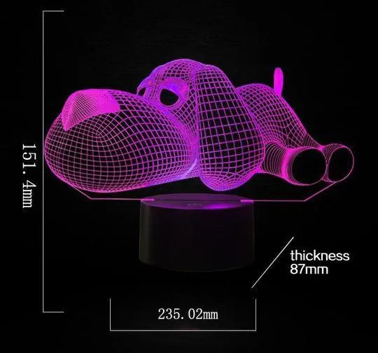 Doggo Desktop Lamp showing 3D dog illusion glowing in blue light on a desk