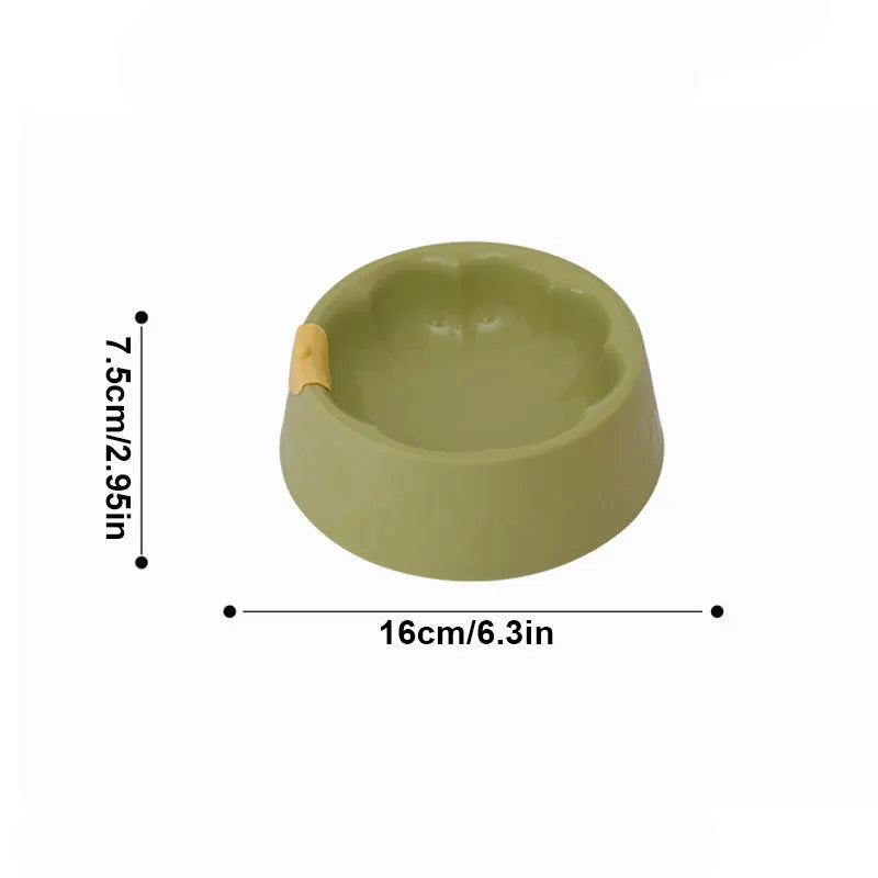 Green plastic double pet bowl with anti-tipping design for dog and cat food and water