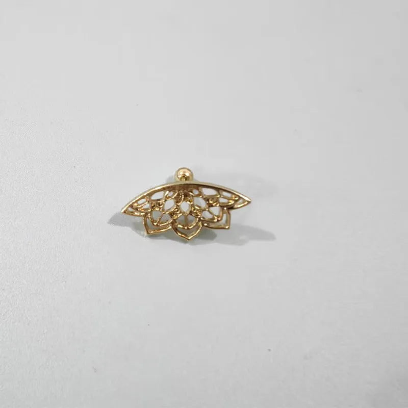 Geometric spider web design metal stud earrings in a gold electroplated finish.