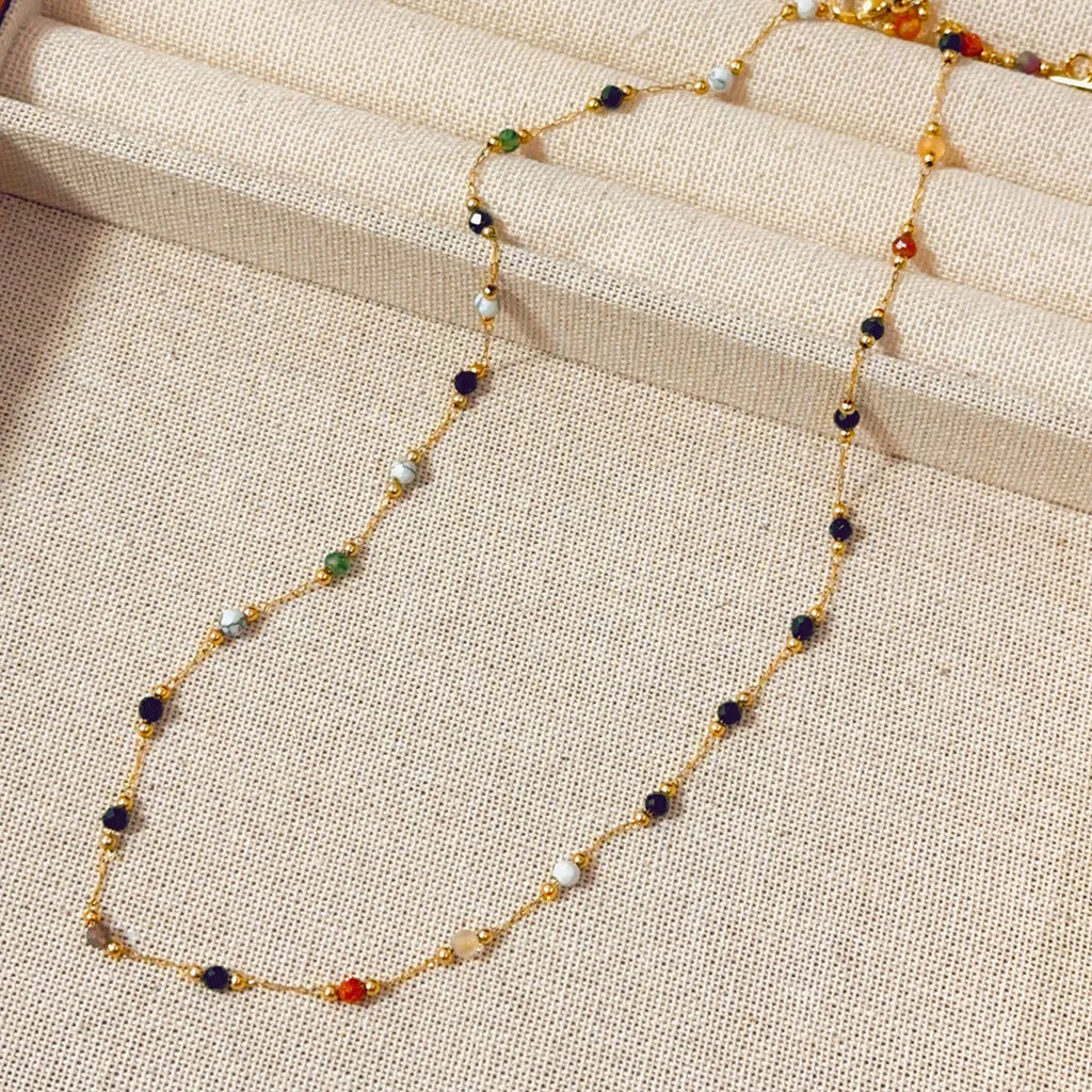 Women's titanium steel necklace with natural stone pendant and gold electroplated finish
