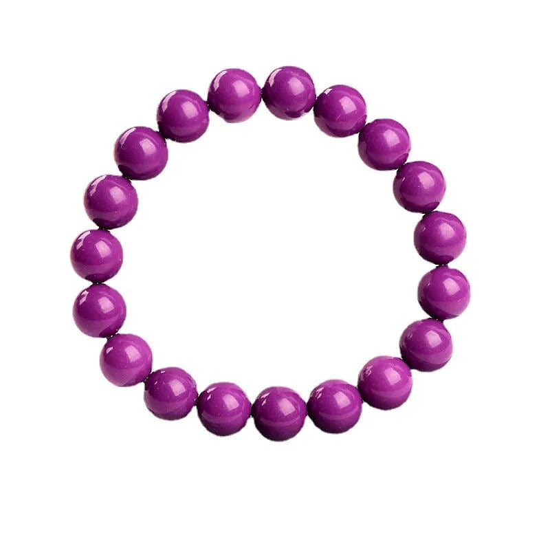 Jiuya polished purple mica crystal bracelet in a single circle design on a wrist.