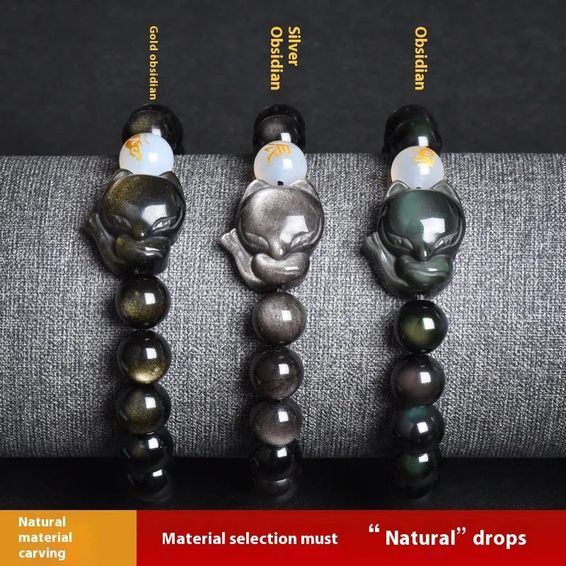 10mm obsidian zodiac bracelet on wrist showing adjustable cord closure and polished stone beads