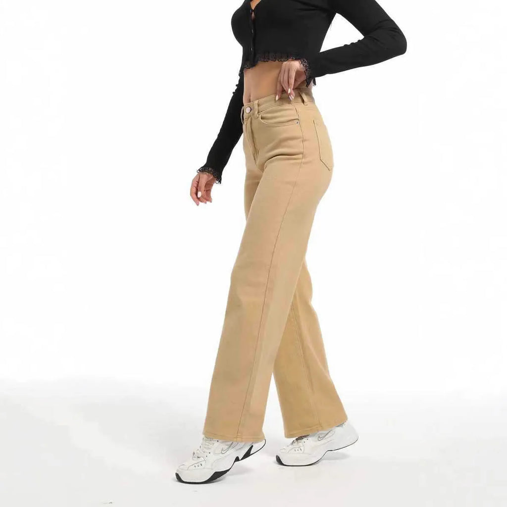 Women's high-waisted wide-leg straight jeans in apricot colour on a hanger