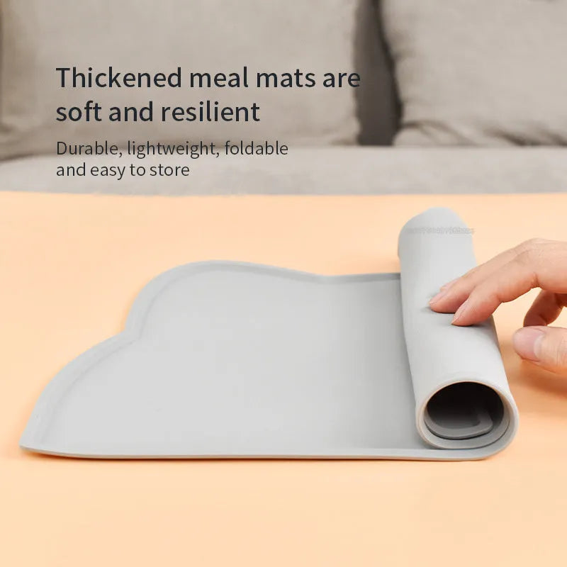 Blue silicone pet feeding mat measuring 44cm by 24cm under a dog bowl