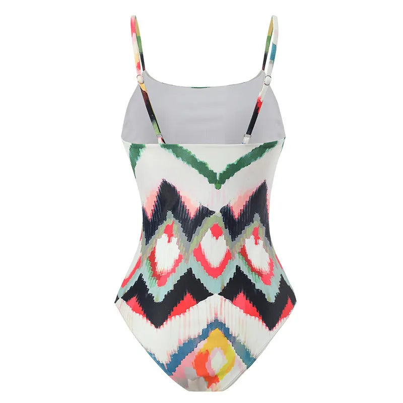 Women's striped two-piece swimsuit with matching hip skirt in gradient print