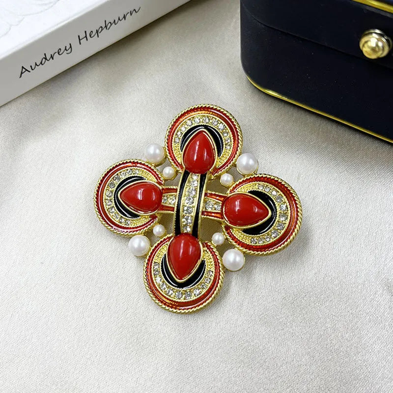 Close-up of a medieval-style baroque cross brooch with crystals, made from zinc alloy in a vintage colour finish.