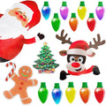 Set of magnetic reflective Christmas light bulb and wire stickers on a car door.