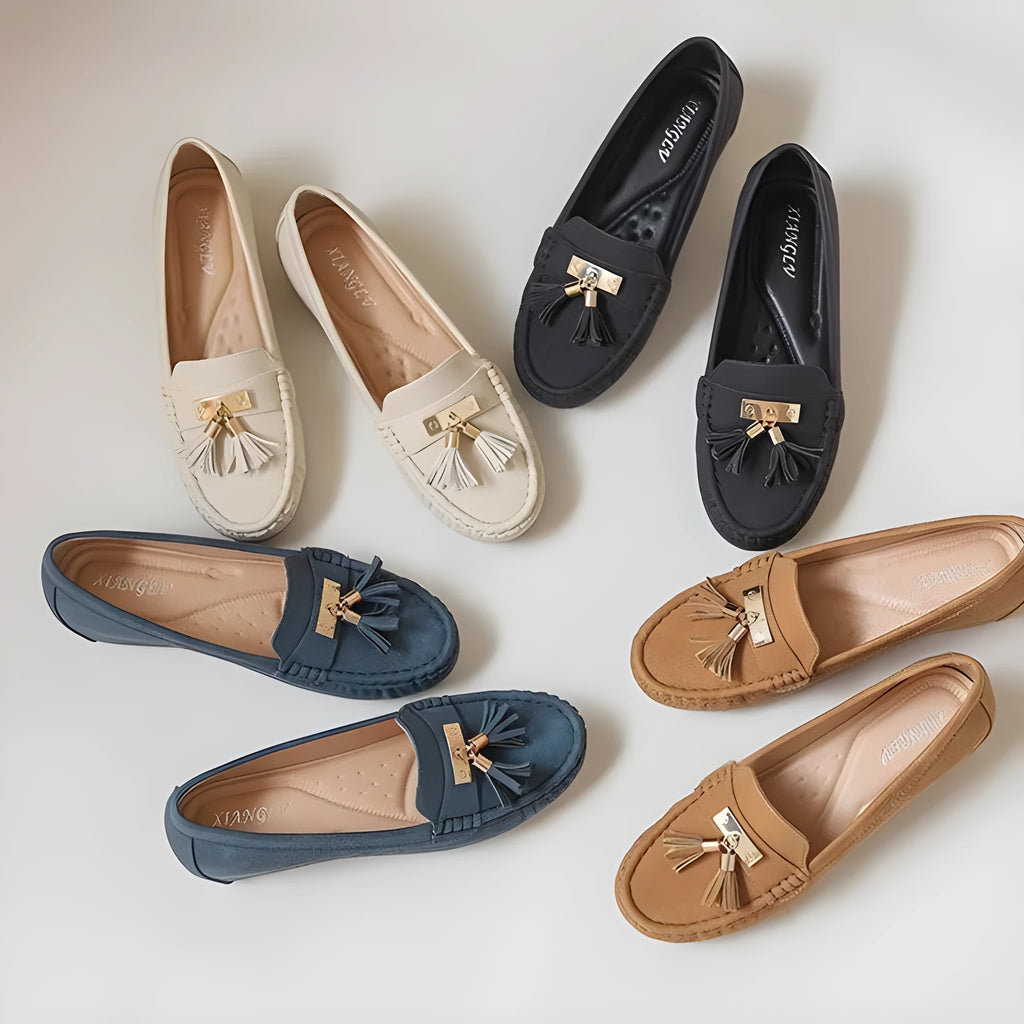 Nude coloured heel height increasing insole with round toe for flat shoes.