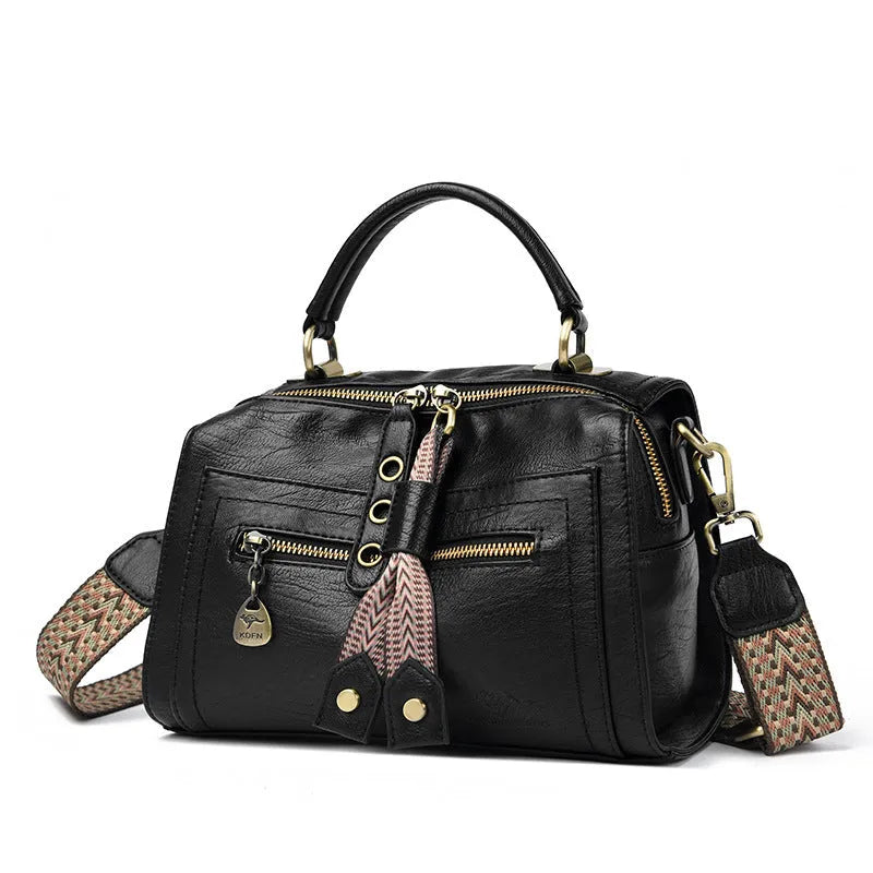 Gray soft PU leather women's crossbody bag with a horizontal square shape and a front sandwich pocket.