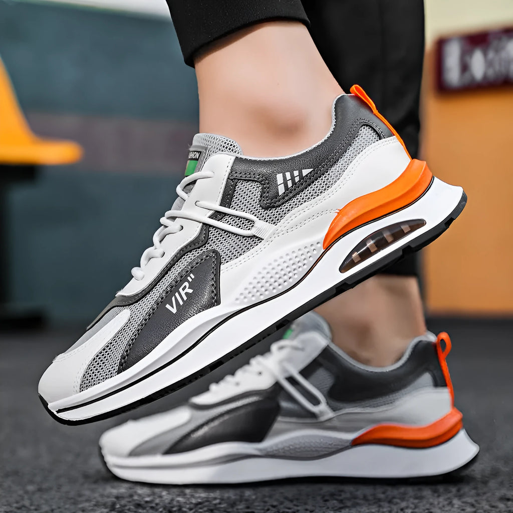 Men's grey breathable mesh casual shoes with a round toe and middle-top height on a white background.