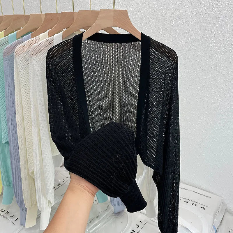 Women's linen blend blouse with hollow-out design and long lantern sleeves in apricot colour